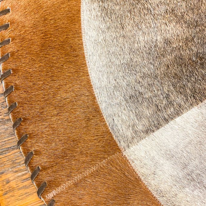 Round Cow Hide Mats - Multiple Sizes available at Rustic Ranch Furniture and Decor.