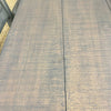 Close-up of a brown table top. Homestead Hills 60" Square Table available at Rustic Ranch Furniture and Decor.