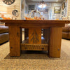 Wooden coffee table with a rustic design in a home setting. Sequoia Coffee Table available at Rustic Ranch Furniture and Decor.