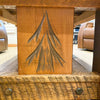 Wooden coffee table with a sequoia tree design in a casual indoor setting. Sequoia Coffee Table available at Rustic Ranch Furniture and Decor.