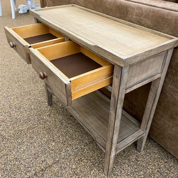 Wooden side table with open drawers against a neutral background. Beach Pebble Side Table available at Rustic Ranch Furniture and Decor.
