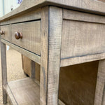 Wooden side table with drawers and a shelf.Beach Pebble Side Table available at Rustic Ranch Furniture and Decor.