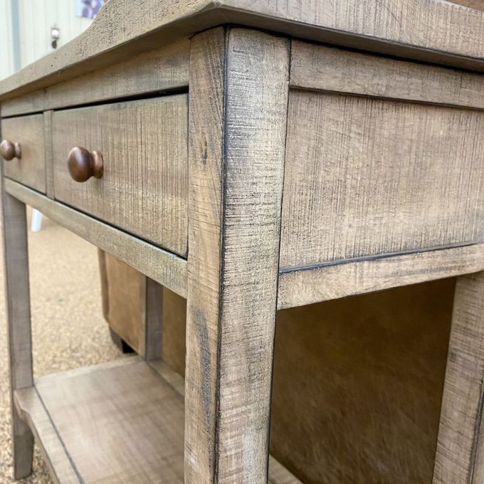 Wooden side table with drawers and a shelf.Beach Pebble Side Table available at Rustic Ranch Furniture and Decor.