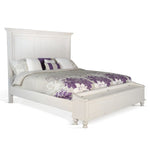 White bed with footboard storage floral bedding on a white background.  Carriage House Bed - King and Queen Sizing available at Rustic Ranch Furniture and Decor.