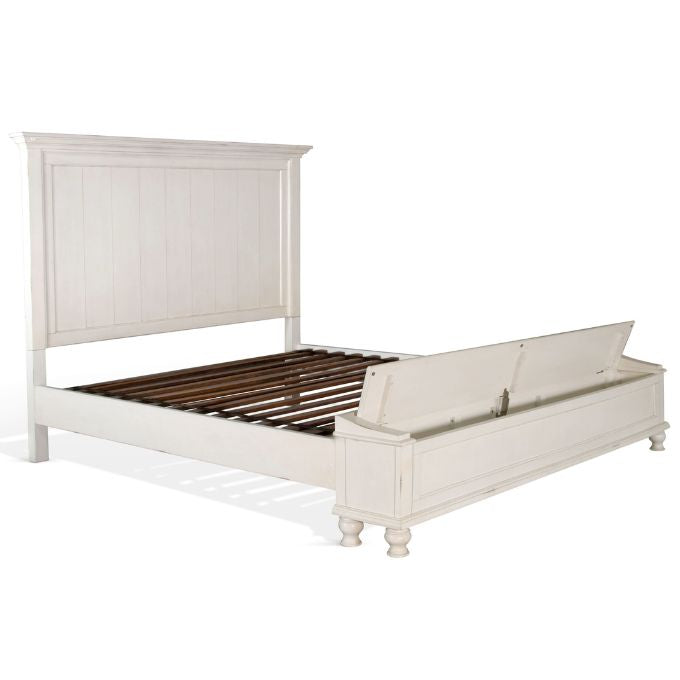 White wooden bed with storage drawers on a white background.  Carriage House Bed - King and Queen Sizing available at Rustic Ranch Furniture and Decor.