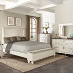 Neatly arranged bedroom with white furniture, including a bed and dresser.  Carriage House Bed - King and Queen Sizing available at Rustic Ranch Furniture and Decor.
