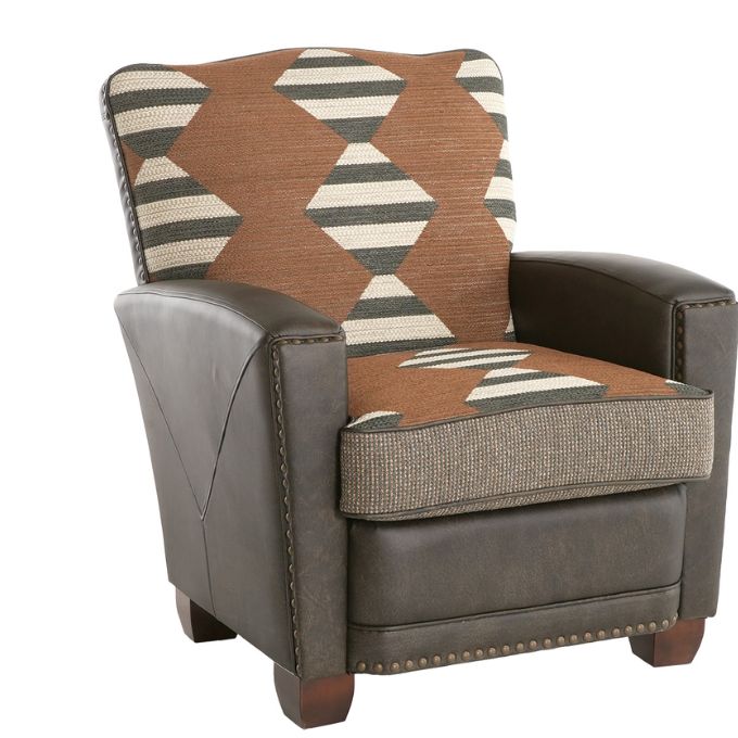 Brown armchair with patterned cushion on a white background.  Hollister Chair at Rustic Ranch Furniture and Decor.
