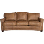 Brown leather sofa on a white background. The Hollister Sofa is available at Rustic Ranch Furniture and Decor.