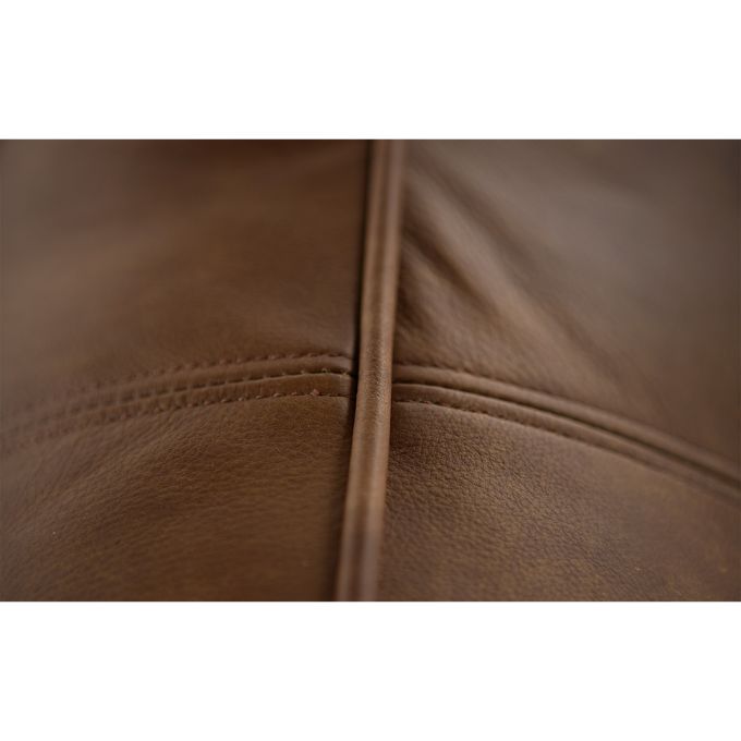 Close-up of brown leather sofa.  The Hollister Sofa is available at Rustic Ranch Furniture and Decor.