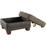 Brown storage ottoman with a cushion on a white background.Hollister Ottoman available at Rustic Ranch Furniture and Decor.