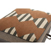 Patterned ottoman cushion with brown, beige, and black geometric design on a white background. Hollister Ottoman available at Rustic Ranch Furniture and Decor.