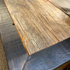 Close-up of the top wooden surface of a sideboard.  Jackson Hole Four Door Sideboard available at Rustic Ranch Furniture and Decor.