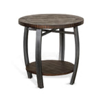 Round wooden side table with metal legs on a white background. Homestead Round End Table available at Rustic Ranch Furniture and Decor.