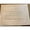 Beige rectangular table top with a subtle pattern on a textured surface. Gianna End Table available at Rustic Ranch Furniture and Decor.