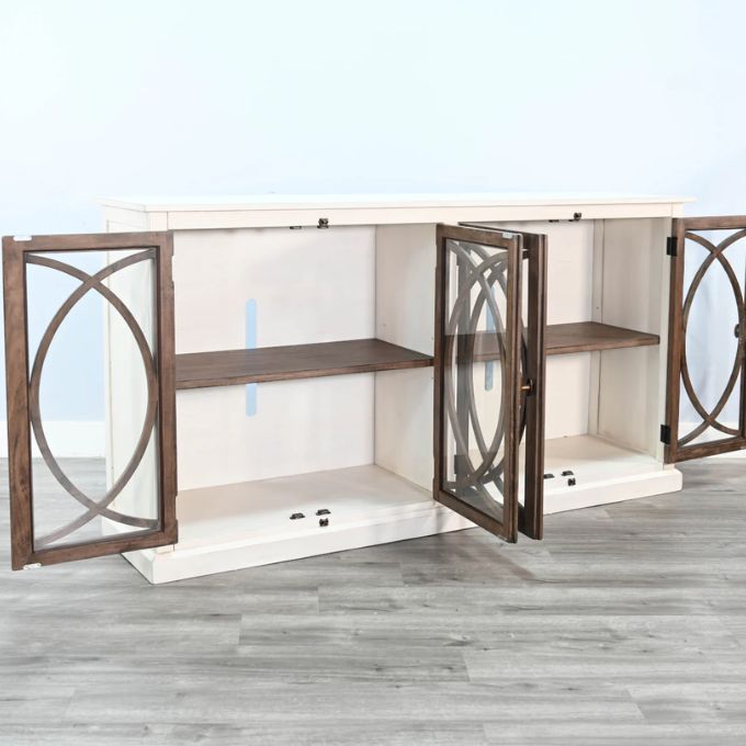 White entertainment console with wooden doors on a gray floor. Pasadena Media Console - 78" available at Rustic Ranch Furniture and Decor.