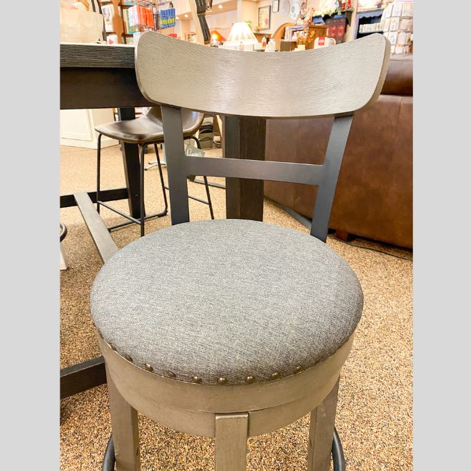 Caitbrook Upholstered Swivel Stools - Two Sizes available at Rustic Ranch Furniture and Decor.