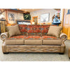 Brown sofa with patterned cushions in a room setting. Emerson Sofa available at Rustic Ranch Furniture and Decor.
