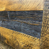 Close-up of wooden planks with a focus on texture and color variation on the Fireside bed available at Rustic Ranch Furniture and Decor.