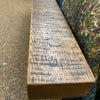 Wooden headboard top with a textured surface.  Fireside bed available at Rustic Ranch Furniture and Decor.