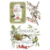 Decorative design with birds, leaves, and a vintage-style label on a white background. Winter Botanist Transfer by IOD available at Rustic Ranch Furniture and Decor.