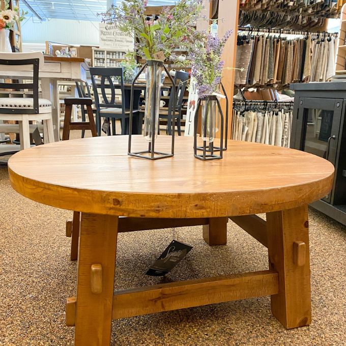 Mackifeld Round Coffee Table available at Rustic Ranch Furniture and Decor.