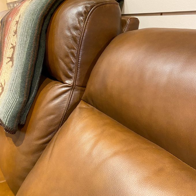 Mustang Power Reclining Sofa with Power Head Rests available at Rustic Ranch Furniture and Decor.