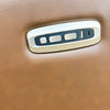 Side panel of love seat with USB port and buttons on a beige leather background.  Vienna Reclining Love Seat available at Rustic Ranch Furniture and Decor.