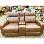 Brown leather love seat in a store setting.  Vienna Reclining Love Seat available at Rustic Ranch Furniture and Decor.
