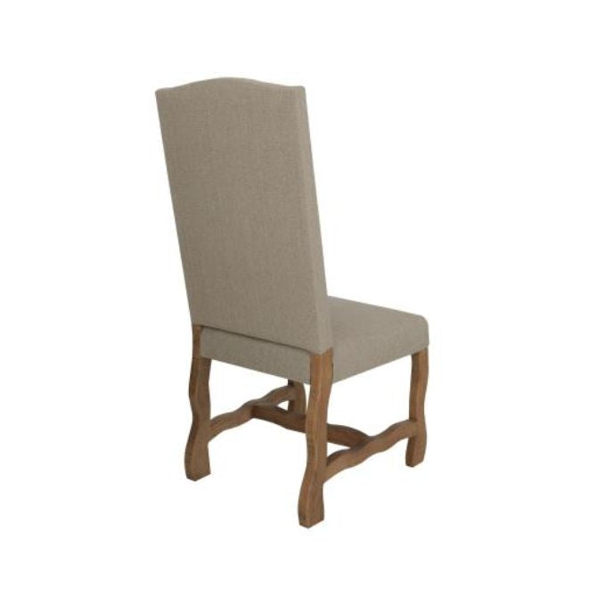 Chair with beige upholstered backrest and wooden frame on a white background. Marquez Dining chair available at Rustic Ranch Furniture and Decor.