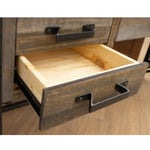 Wooden drawer with metal handles on a wooden surface. Loft Brown Filing Cabinet available at Rustic Ranch Furniture and Decor.