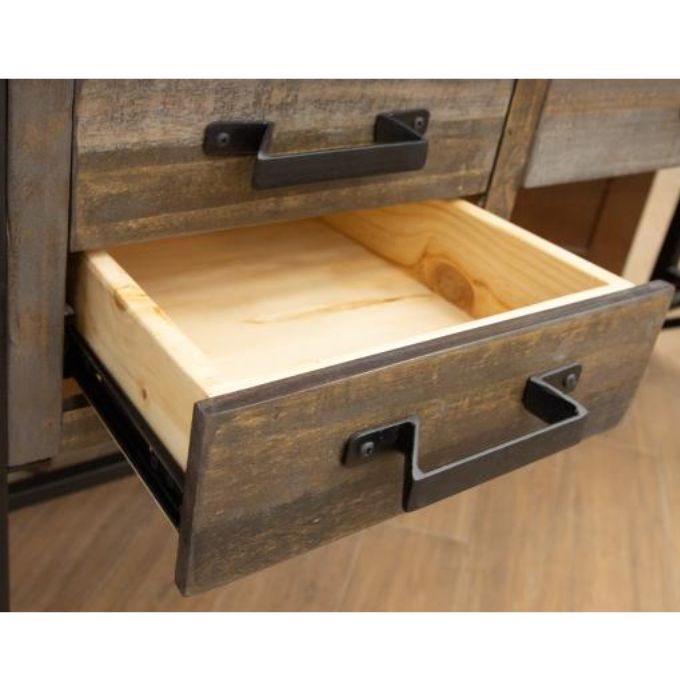 Wooden drawer with metal handles on a wooden surface. Loft Brown Filing Cabinet available at Rustic Ranch Furniture and Decor.