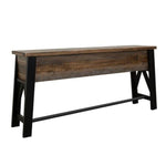 Wooden sofa table with black legs on a white background. Loft Brown Counter Height Sofa Table available at Rustic Ranch Furniture and Decor.