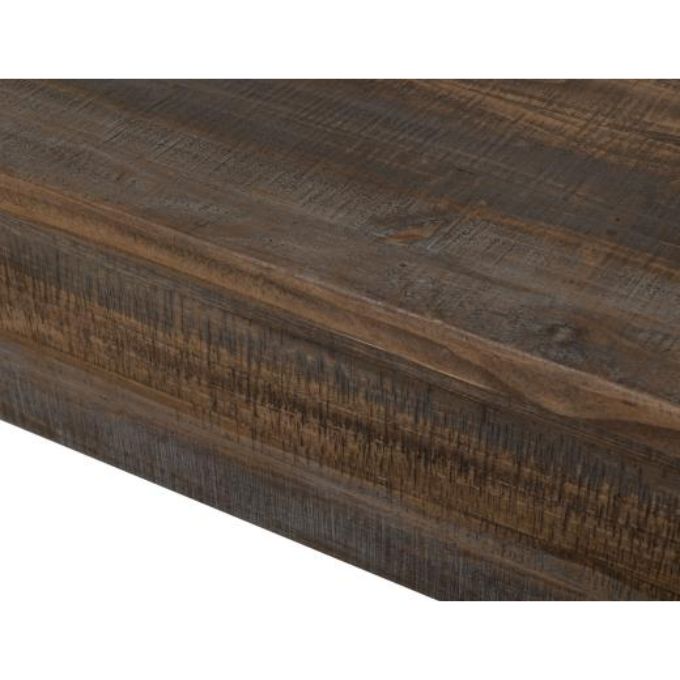 Close-up of a wooden surface with a dark brown finish. Loft Brown Counter Height Sofa Table available at Rustic Ranch Furniture and Decor.