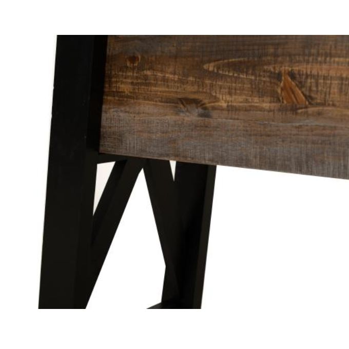 Close-up of a wooden surface with a black leg on a white background. Loft Brown Counter Height Sofa Table available at Rustic Ranch Furniture and Decor.