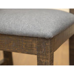 Wooden stool with a gray cushioned seat. Loft Brown Wooden Stool with Back- 24" and 30" available at Rustic Ranch Furniture and Decor.