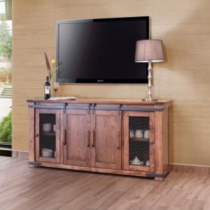Wooden TV stand with a television mounted on a wall in a room.
Parota TV Stands - 60" and 70" available at Rustic Ranch Furniture and Decor.