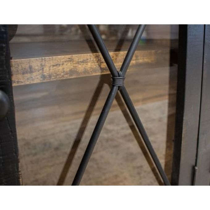 Close-up of a metal detail on  glass door fronts on the Vintage Black 70" Cabinet available at Rustic Ranch Furniture and Decor.