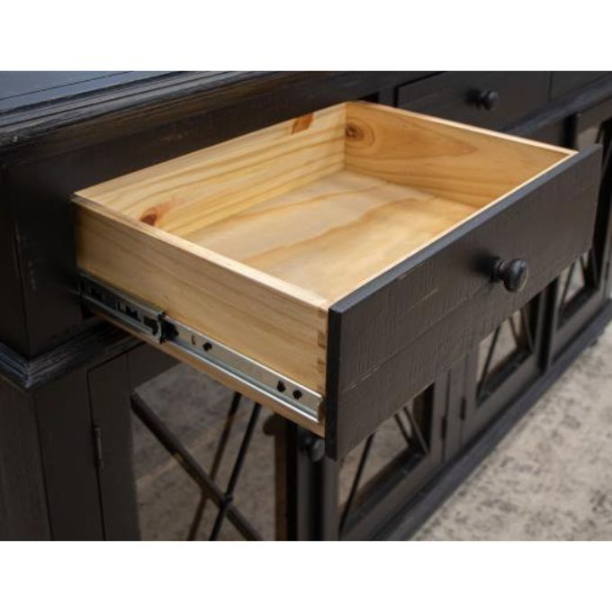 Wooden drawer being pulled out from the  Vintage Black 70" Cabinet available at Rustic Ranch Furniture and Decor.