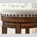 Valebeck Backless Upholstered Swivel Stool - Brown - Two Heights available at Rustic Ranch Furniture in Airdrie, Alberta.