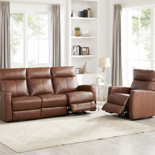 Brown leather sofa and recliner in a living room with white walls and large windows. Vienna Reclining Sofa available at Rustic Ranch Furniture and Decor.