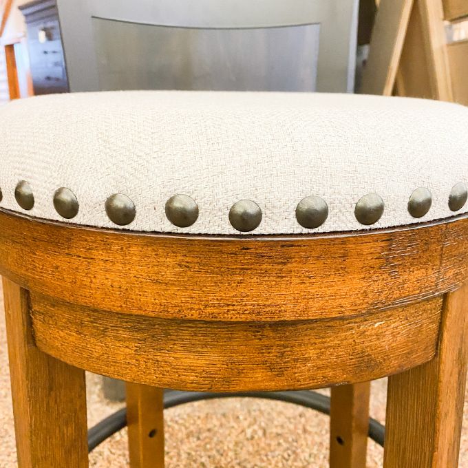 Valebeck Upholstered Swivel Stool - Brown available at Rustic Ranch Furniture in Airdrie, Alberta.