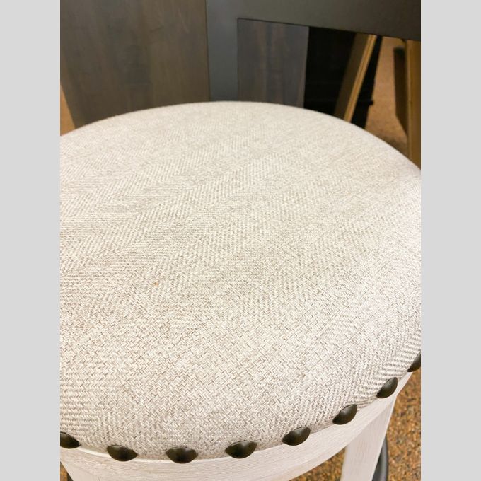 Valebeck Upholstered Swivel Stool - White available at Rustic Ranch Furniture in Airdrie, Alberta