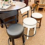Valebeck Upholstered Swivel Stool - White available at Rustic Ranch Furniture in Airdrie, Alberta